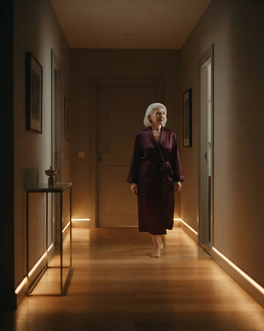 Retirement home resident walking a hallway lit by Irabelle night lights